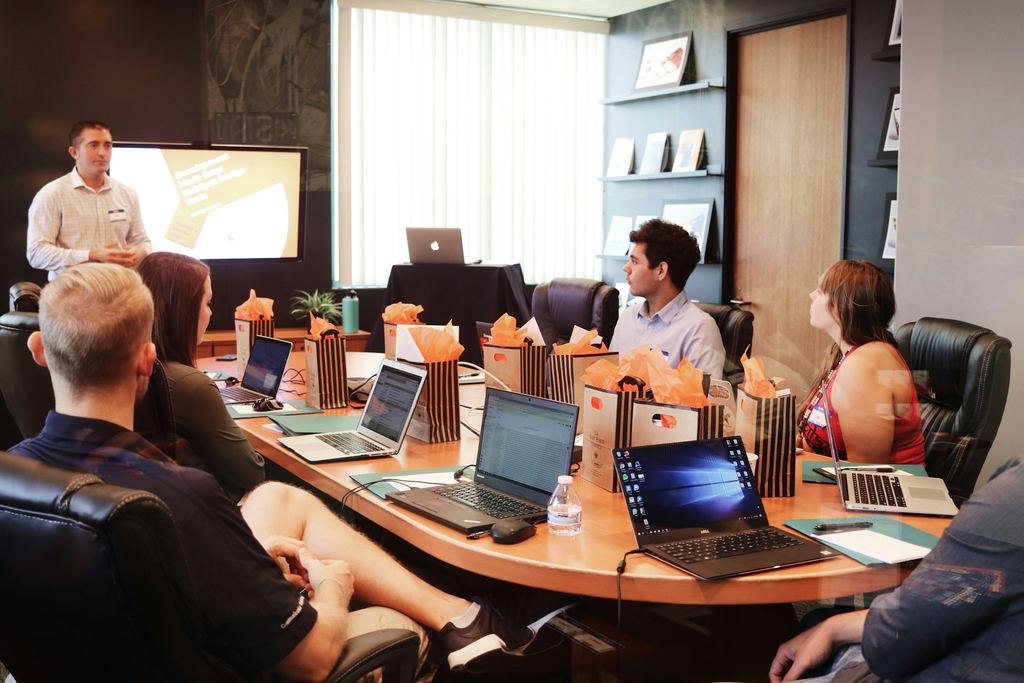 Team discussing strategy in boardroom